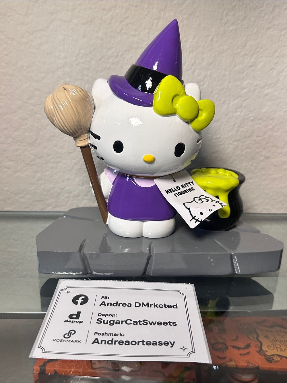 Hello Kitty Purple Witch Figurine with Yellow Bow and Cauldron